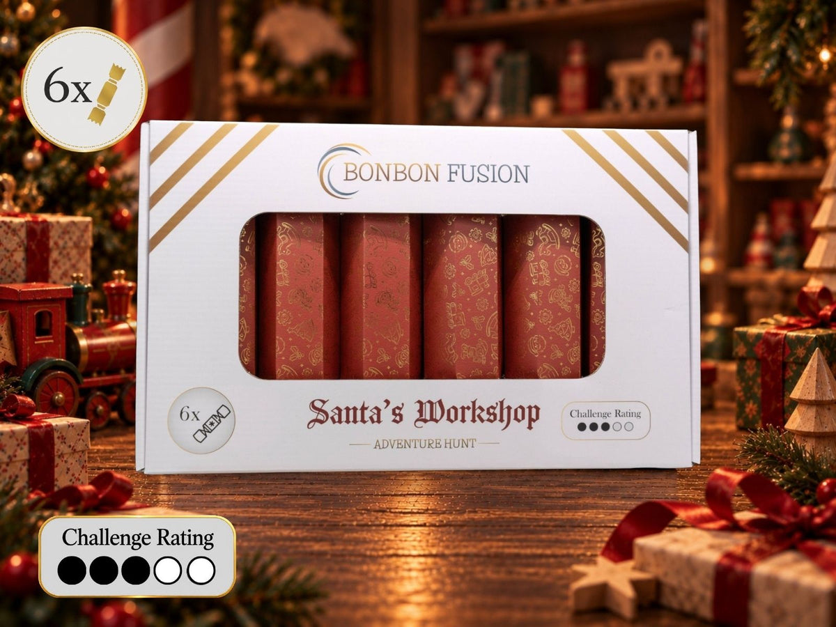 Bonbon Fusion Santa’s Workshop Adventure Hunt pack of six red and gold Christmas bonbons, displayed with a toy train and wrapped gifts in a warmly lit workshop setting. Challenge rating: 3 out of 5.
